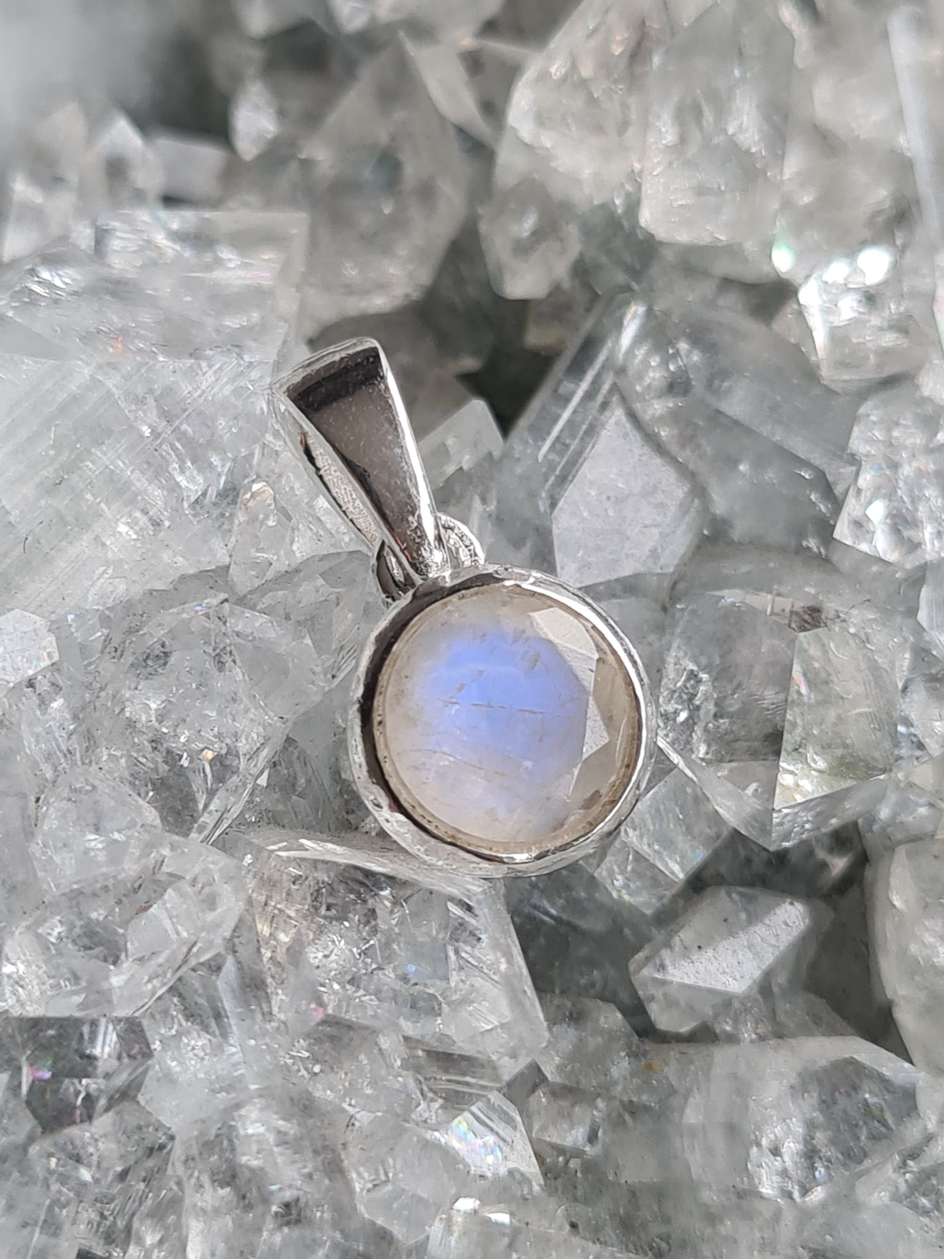 Natural Rainbow Moonstone Faceted Pendant in Sterling Silver. Displaying a blue flash.