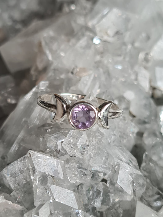 Triple Moon Ring set with a round faceted amethyst