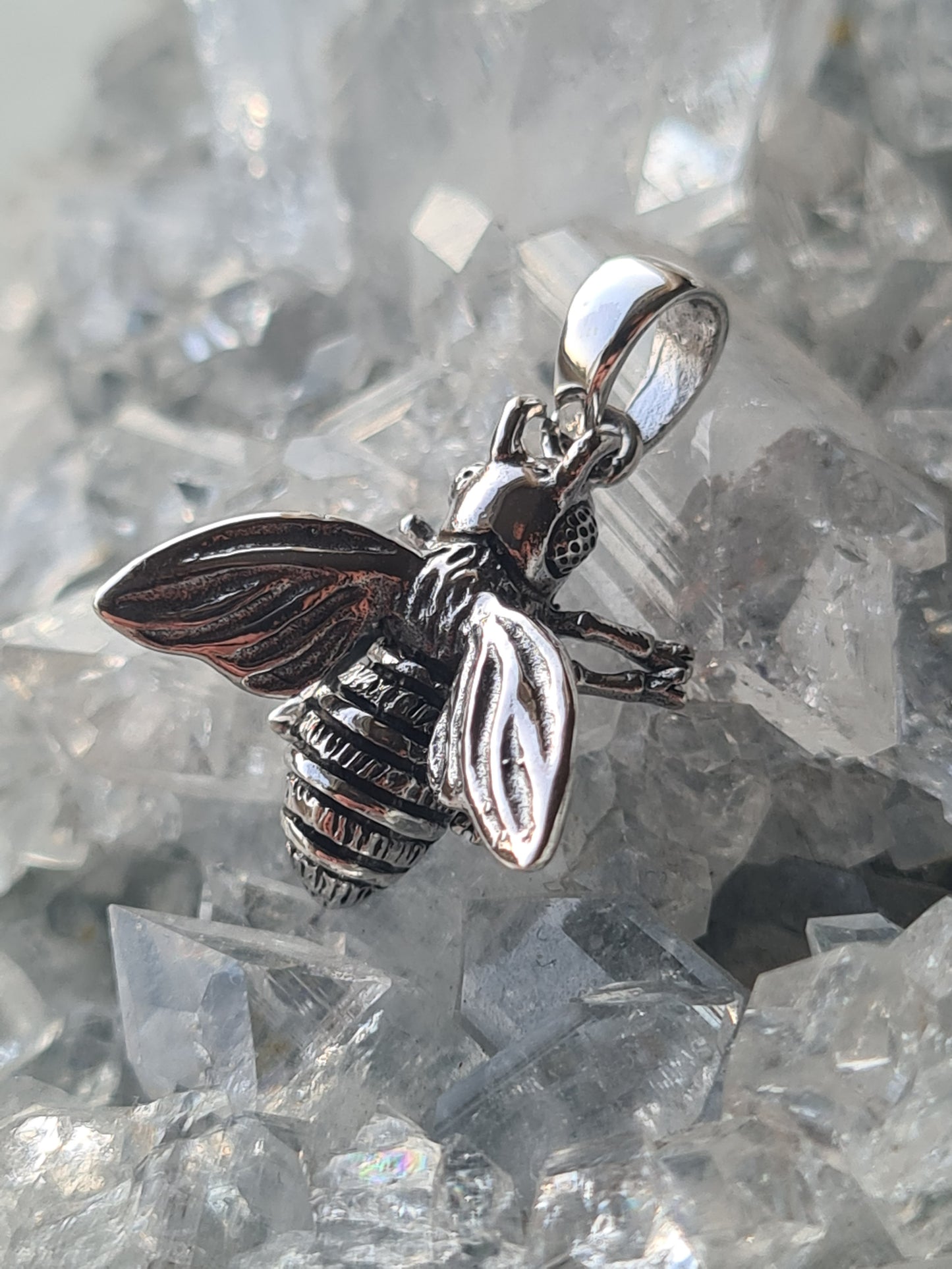 A Sterling Silver Bee Pendant.