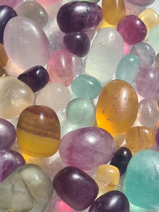 Bright and colourful candy fluorite tumbles, three sizes available. Colours of green, yellow, purple and white. Choose your size from the menu!