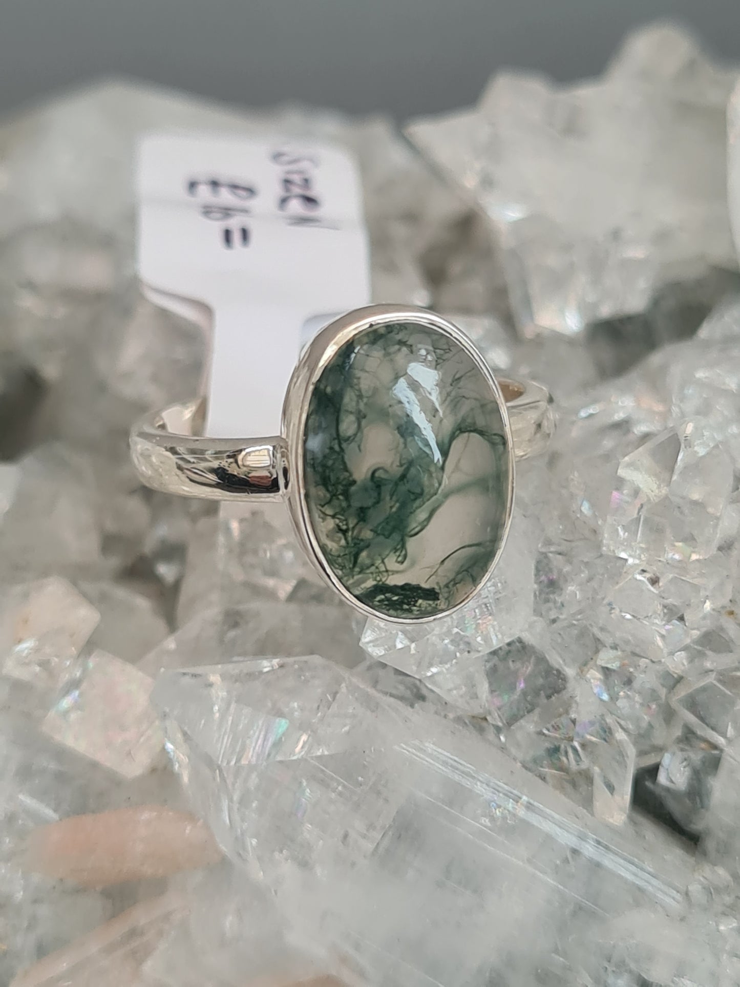 Moss Agate Ring, oval shaped cabochon, rubover set with D-shaped shoulders/shank. UK Size N