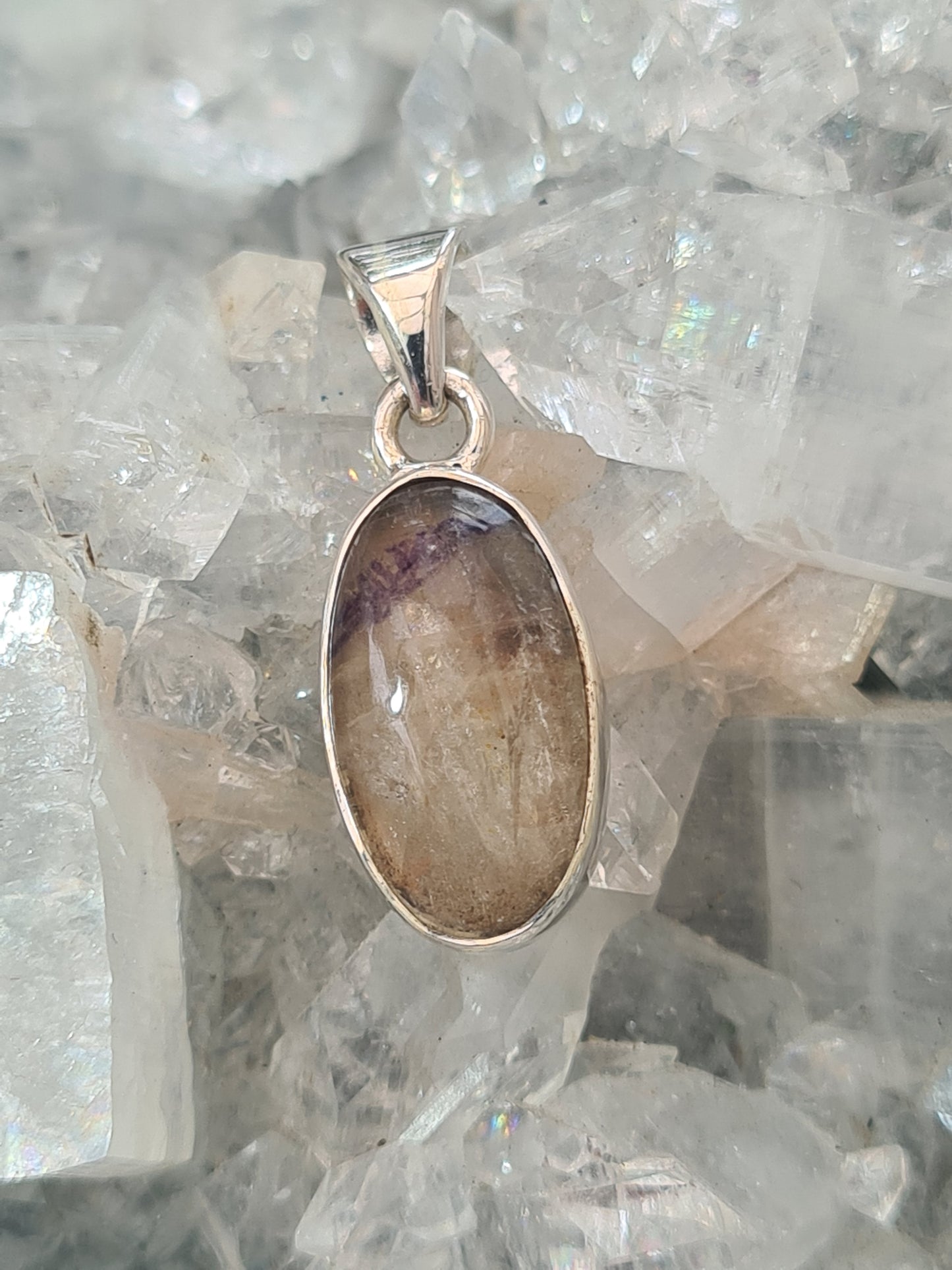 Natural Derbyshire Blue John Fluorite Pendant in Sterling Silver. Oval shape with purple banding.