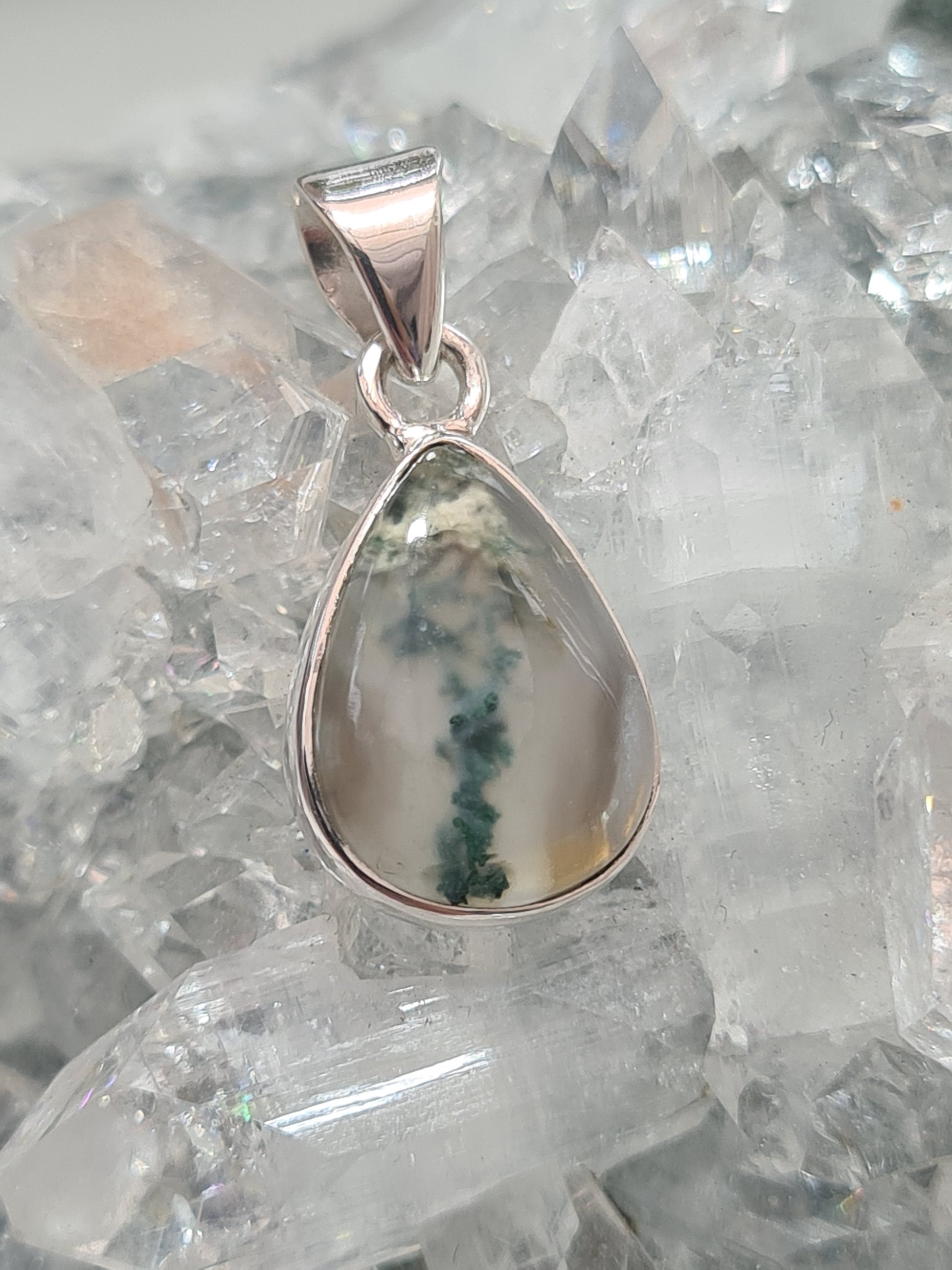 Pear shape moss agate pendant in sterling silver