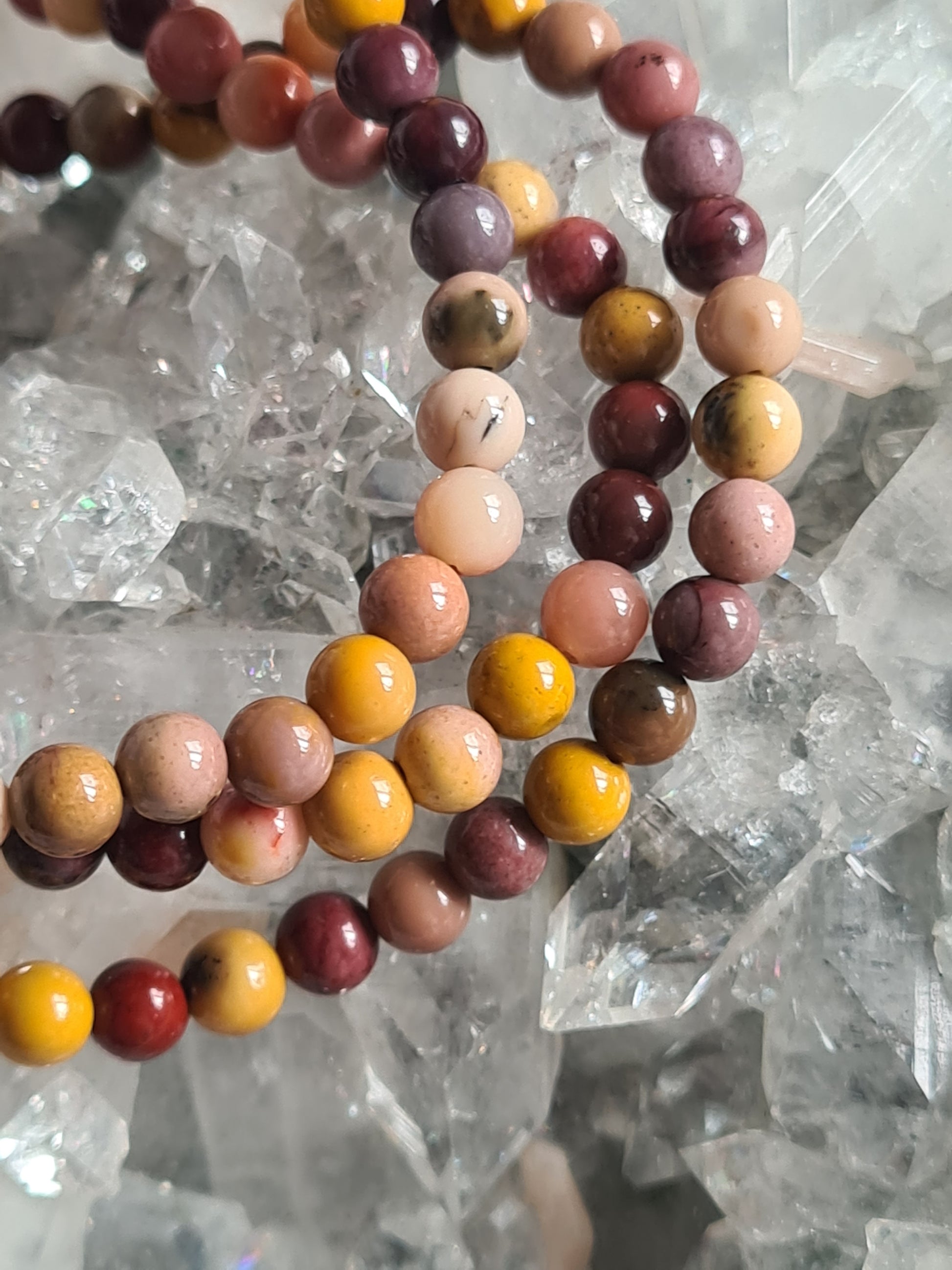 Three 4mm round bead mookaite bracelets, in colours of yellow, red, pink and vanilla.