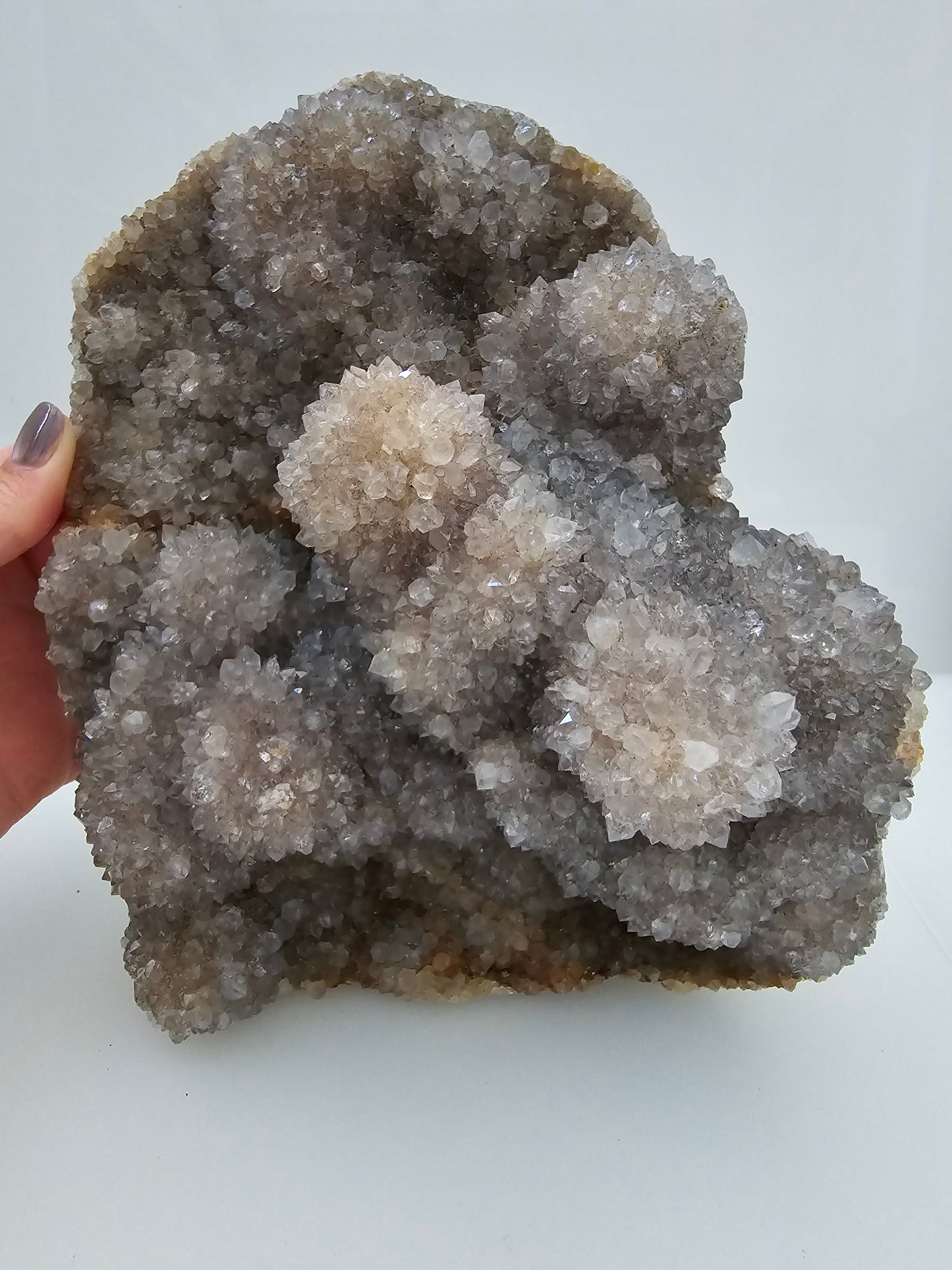 Large Botroydial Form Amethyst Raw Cluster with Agate Base showing Stalactite Structures. Grey to lilac colour. 20cm tall.