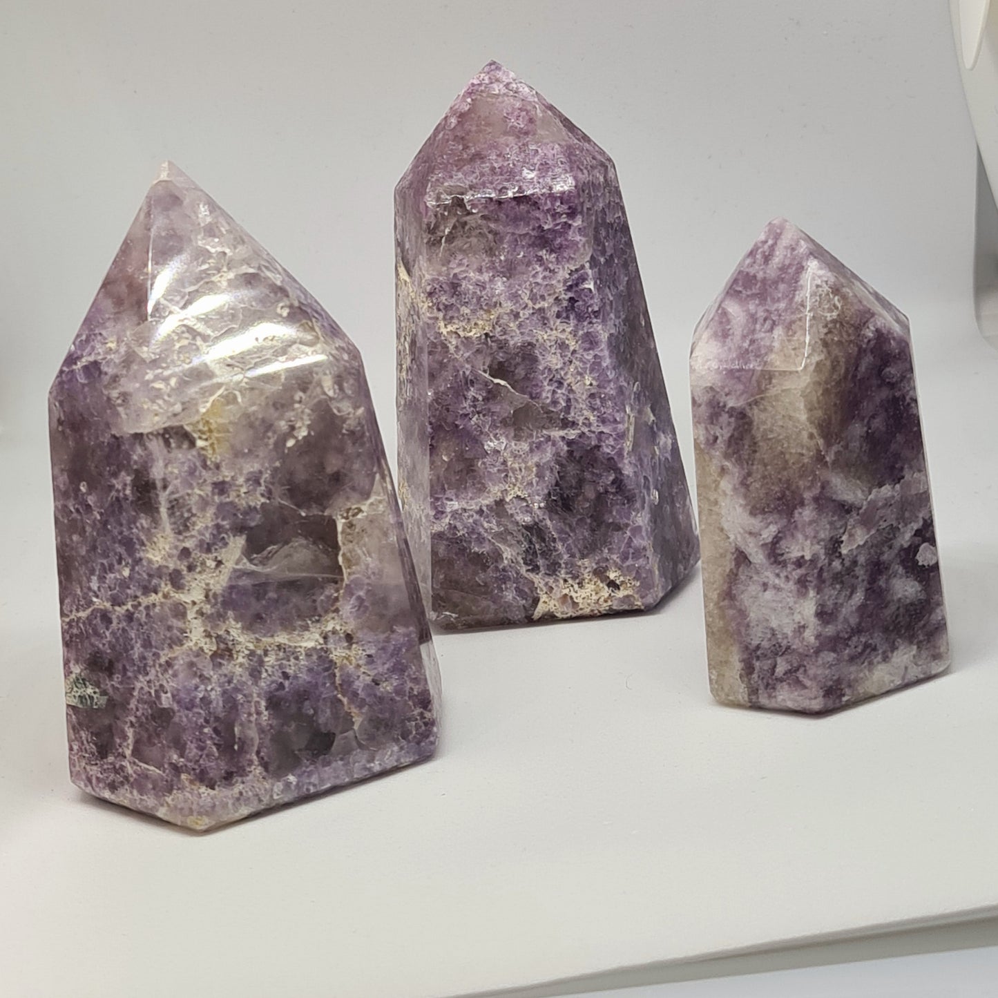 Three Incredible purple mica / lepidolite towers from Brazil, some having smoky quartz inclusions