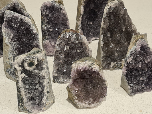 Group image of our Black Galaxy Amethyst Raw Cut Base Freeforms