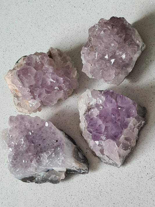 Four Untreated Natural Raw Purple Amethyst Clusters from Brazil 