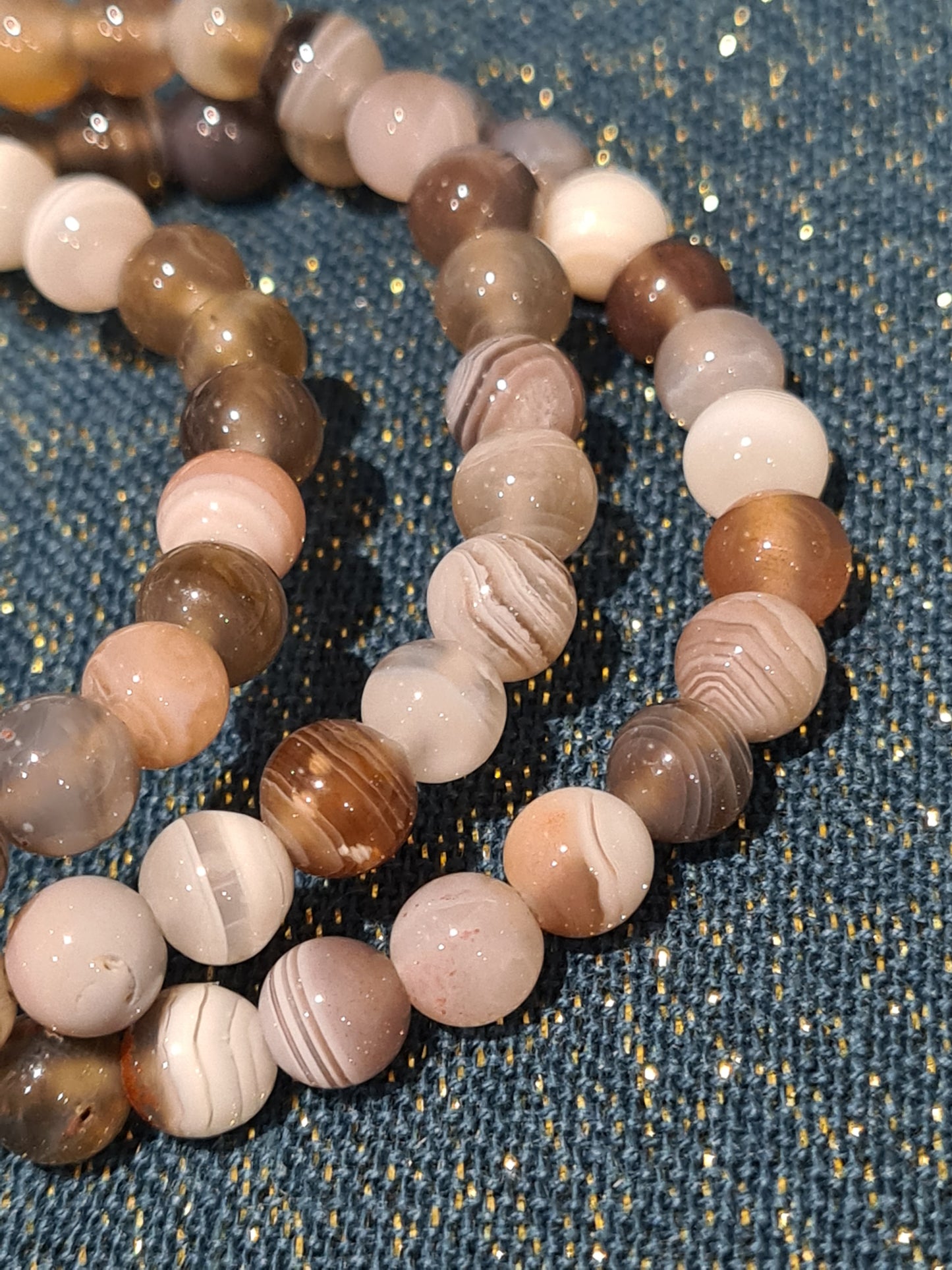 Botswana agate 6mm beaded bracelets in colours of brown, cream and pinks, with white banding. 