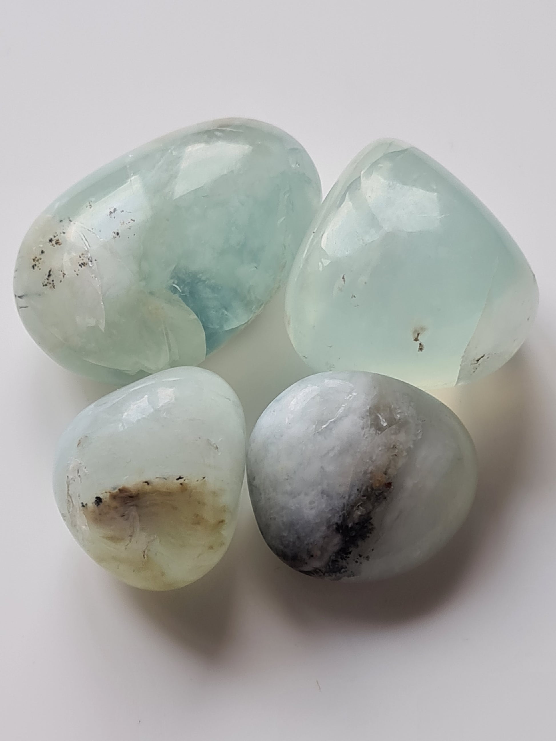 Blue Opal Tumbles from Peru. They are found at the base on Andean Mountains and bring a calming peaceful energy.
