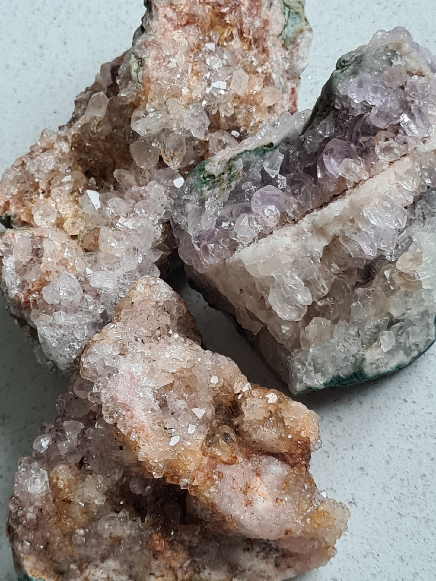 A collection of Pink Amethyst Raw Clusters from Brazil
