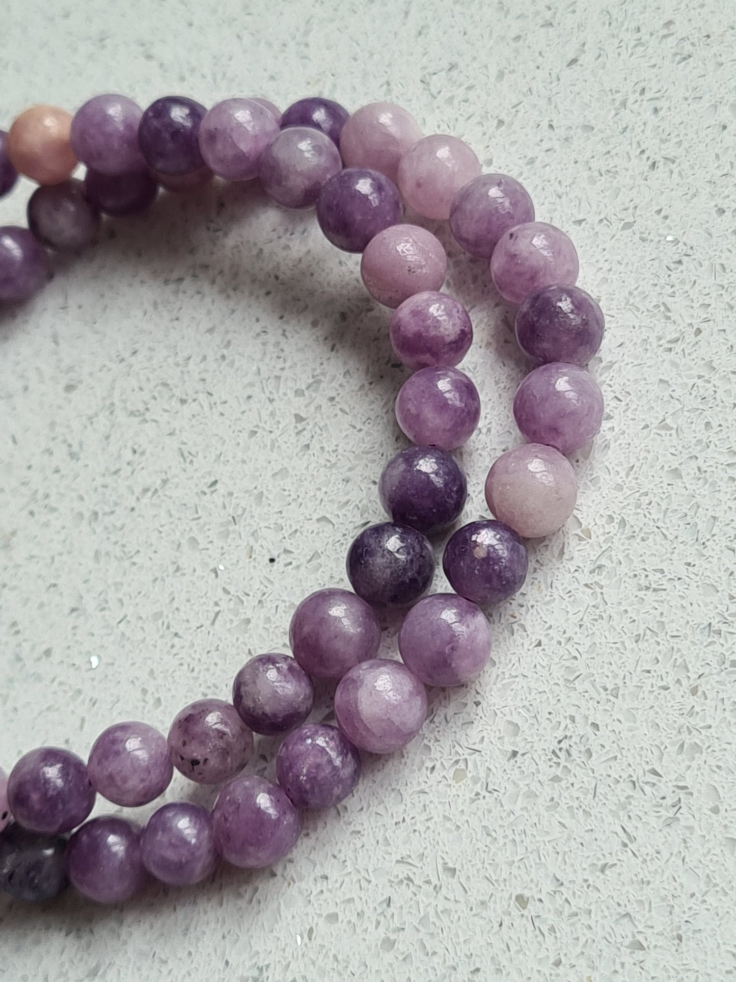 Two light toned lepidolite/purple mica bracelets on elasticated band, 6mm size beads