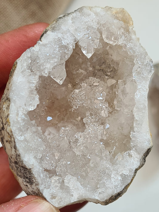 A half Moroccan Quartz Geode with fine quality clear quartz formations inside. 5 to 6cm. You will receive a full geode.