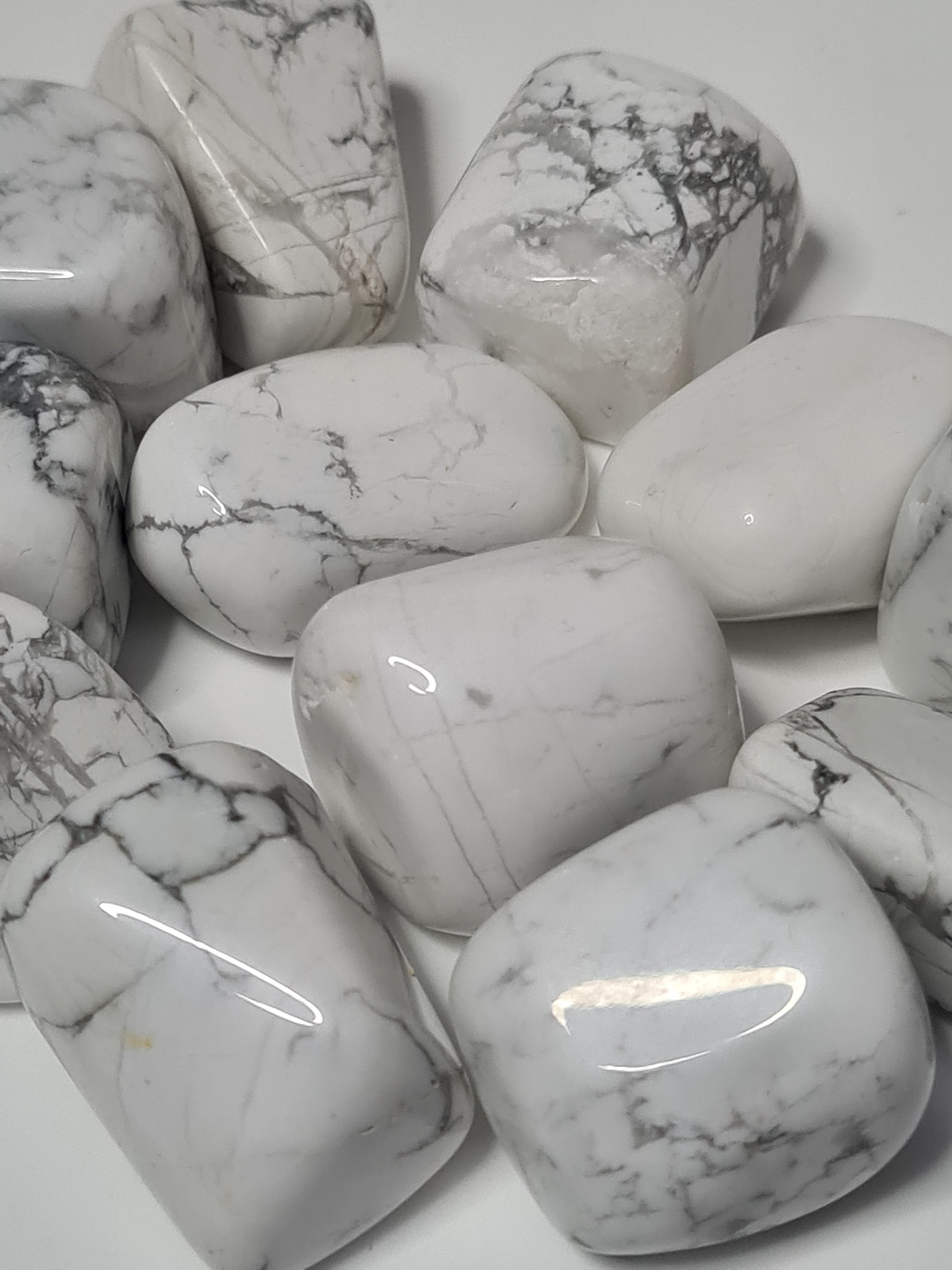 Beautiful bright white howlite tumbles with grey marbling