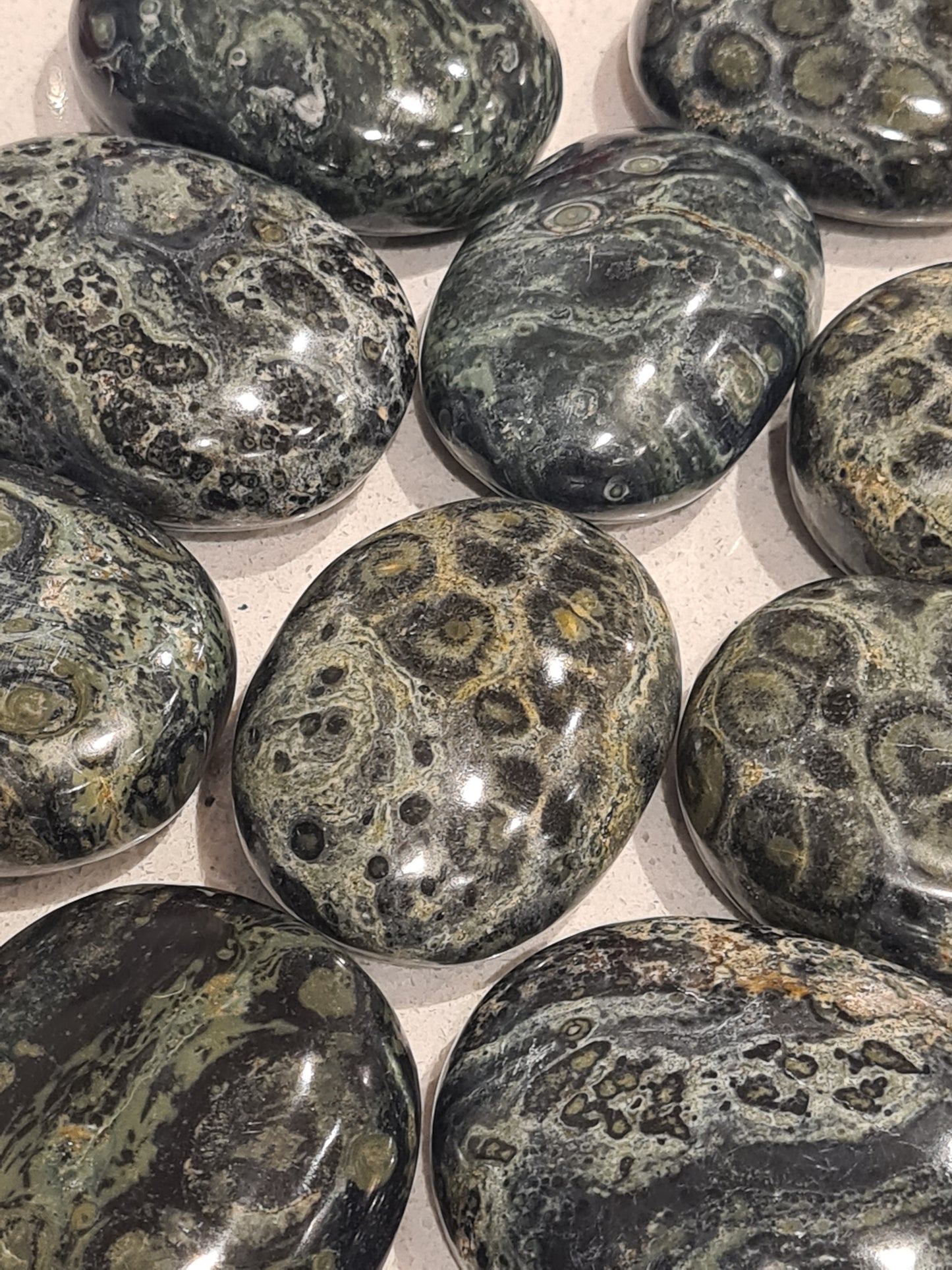 Collection of kambaba jasper palmstones from madagascar. Intuitively chosen.