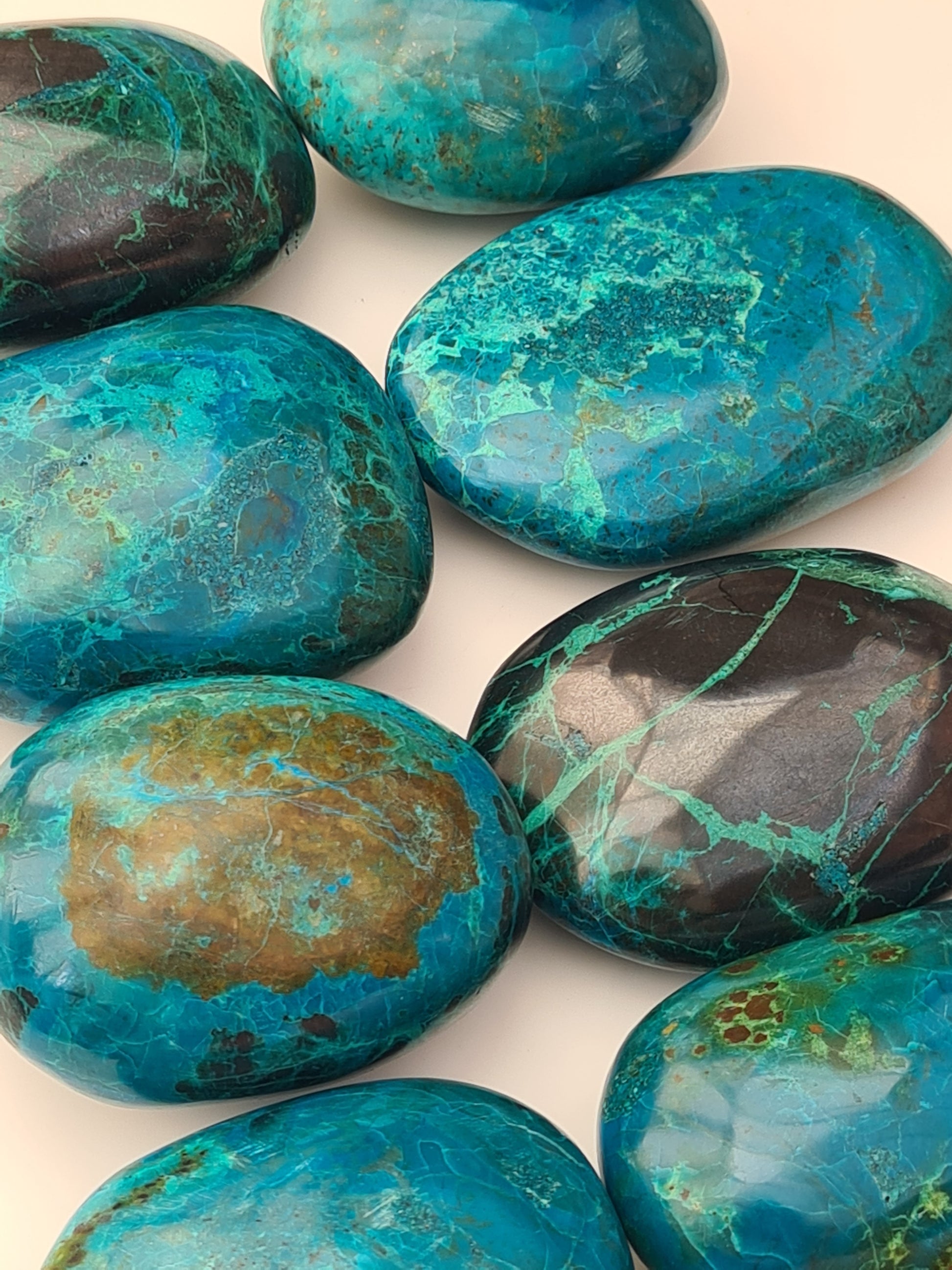 Chrysocolla from Peru in vivid blues, green and black. All natural and ethically sourced