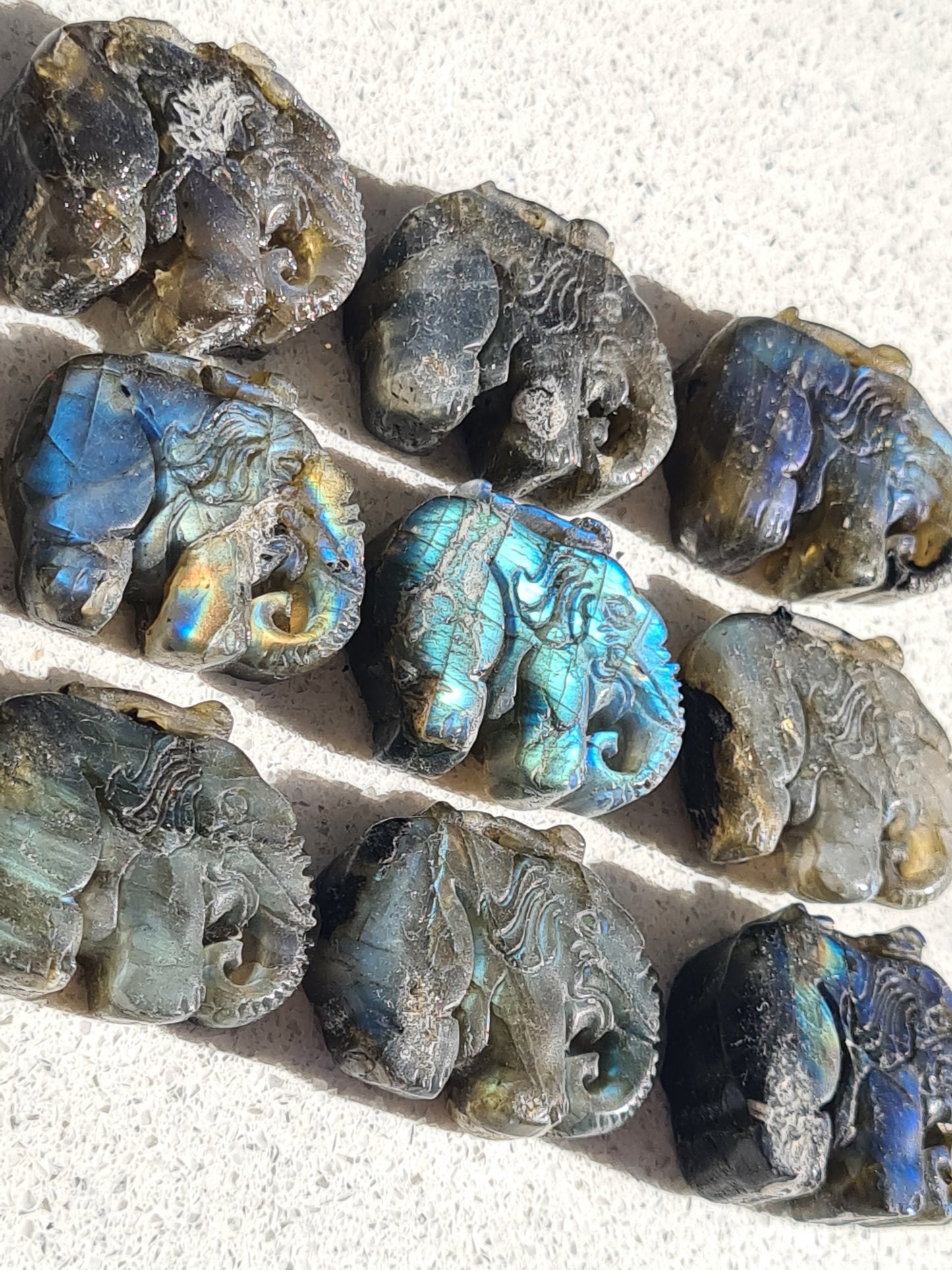 Labradorite Elephant Carving with blue or multi coloured flash. 7 available.