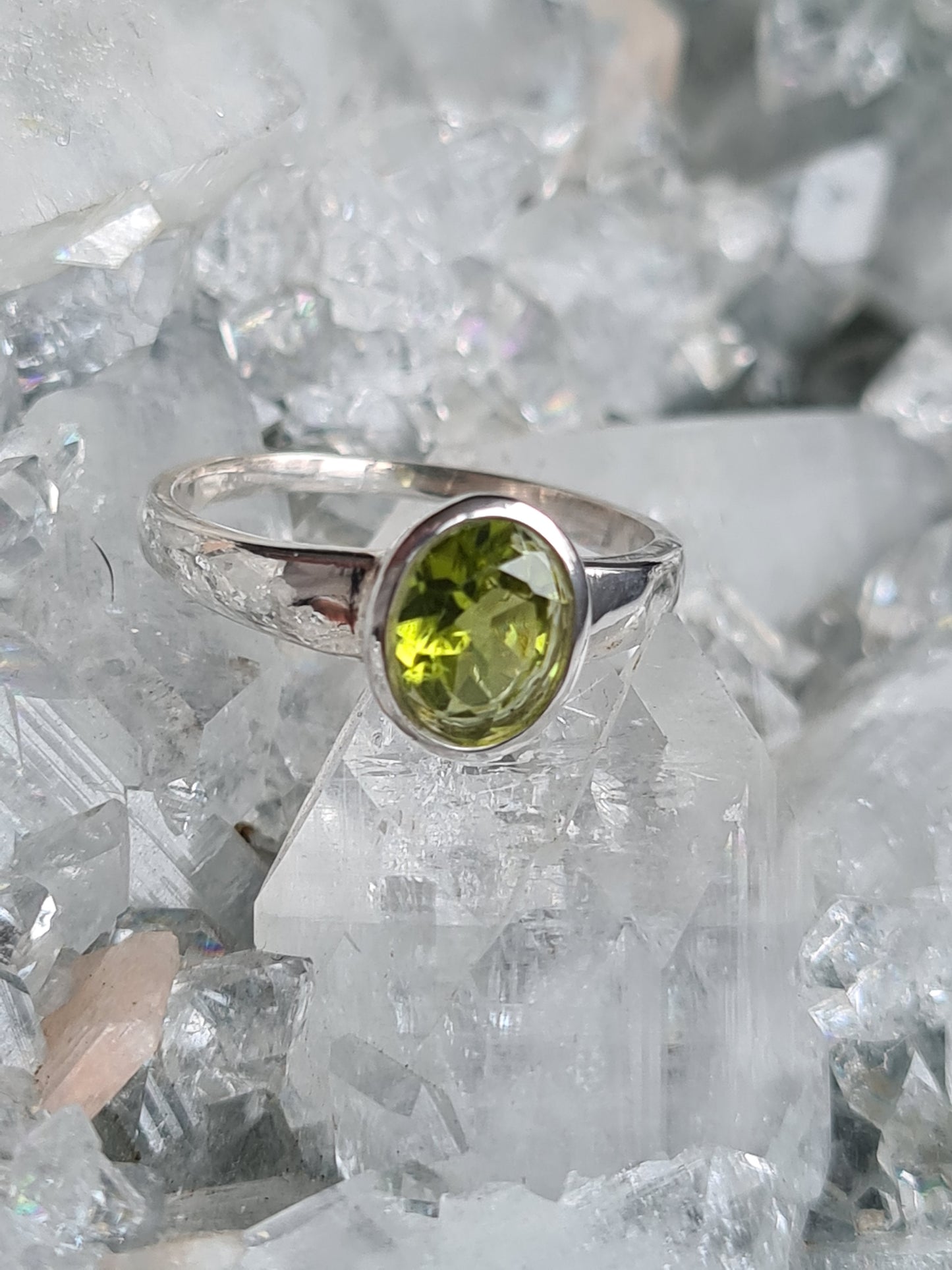 Natural Green Peridot, Rubover set into sterling silver. UK Size L
