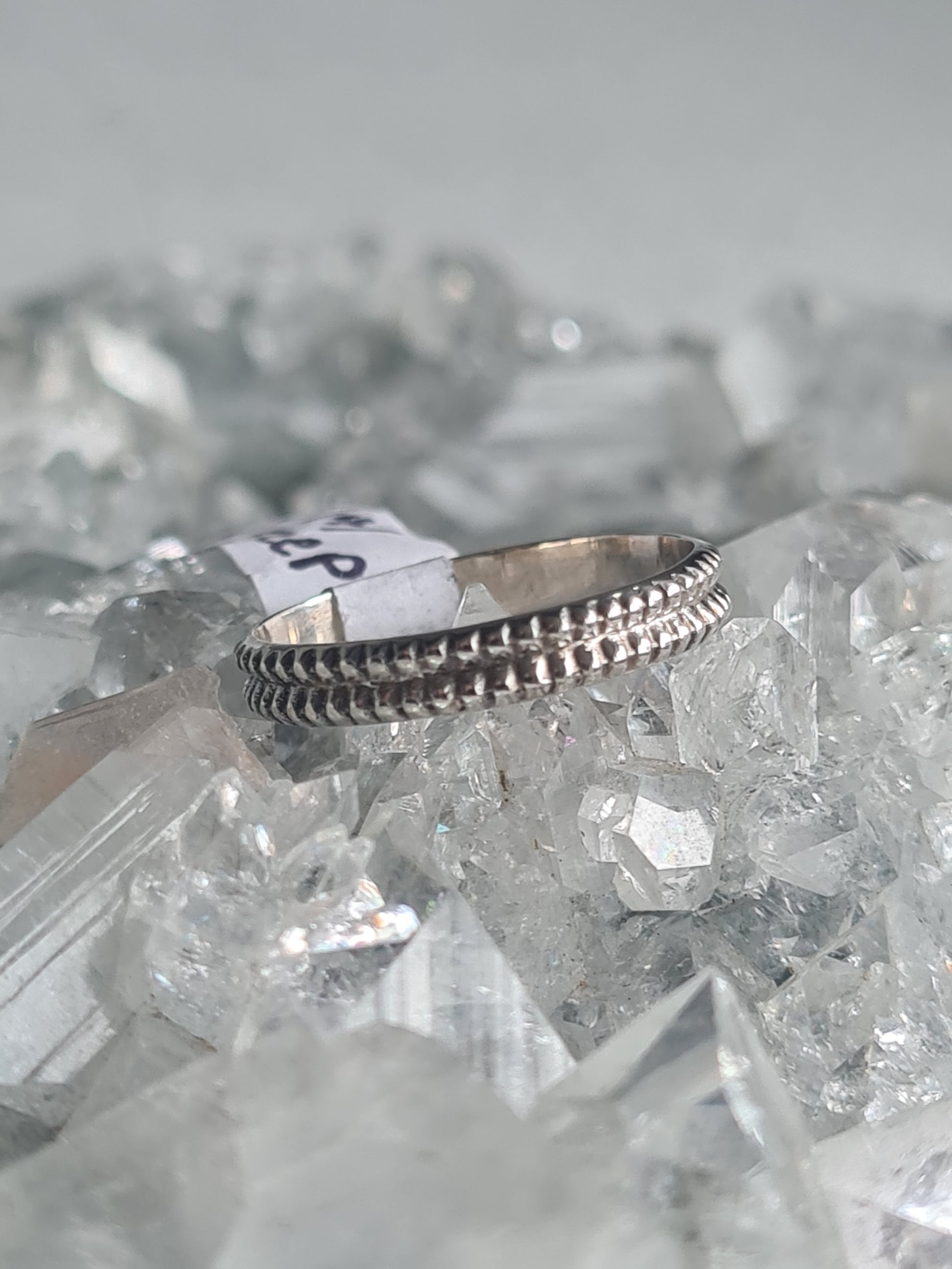 A double row bead design band, 4mm wide, in Sterling Silver. Sizes available M and P