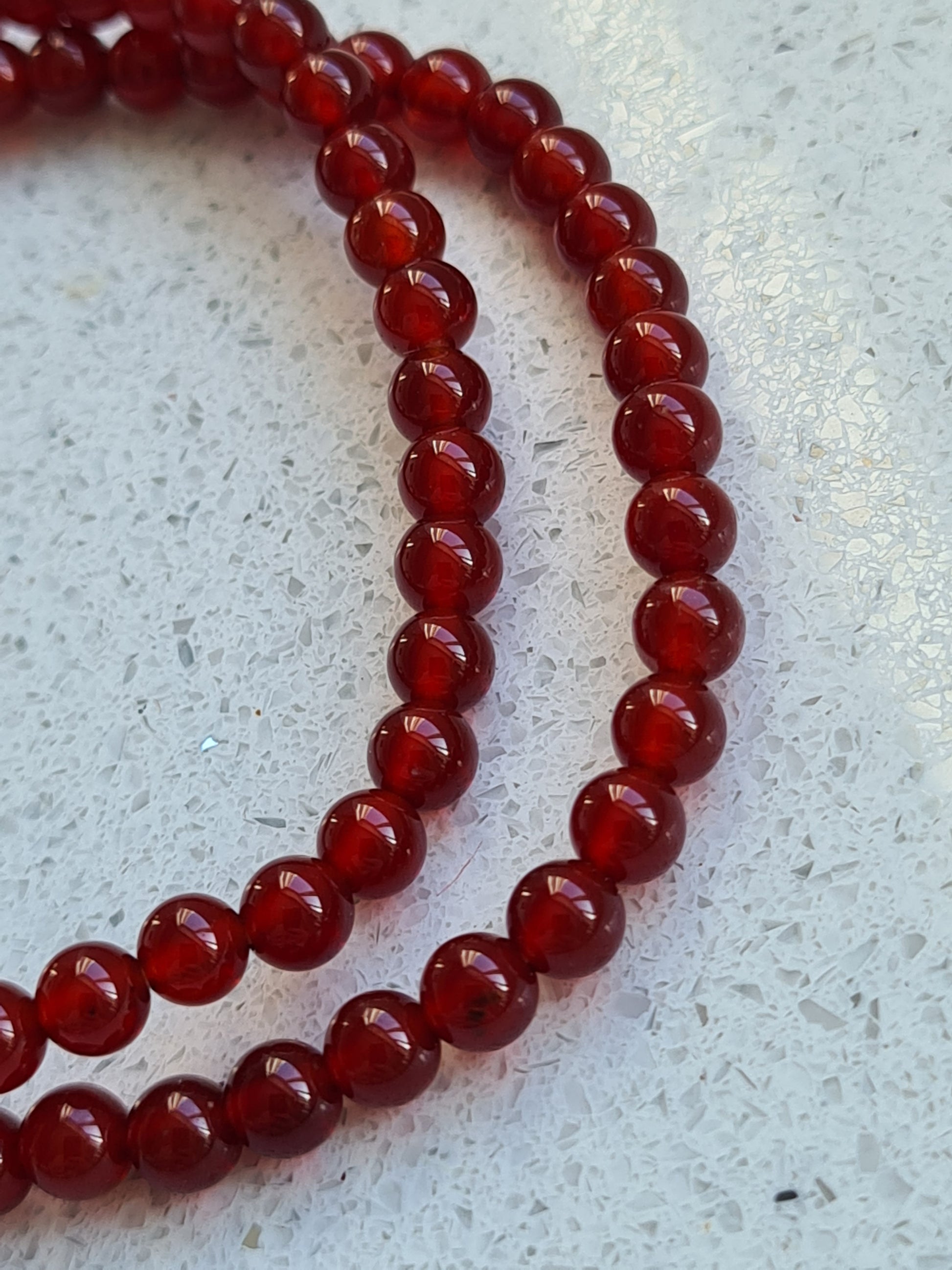 Deep Reddish Orange Carnelian Bead Bracelet, 4mm rounded beads.