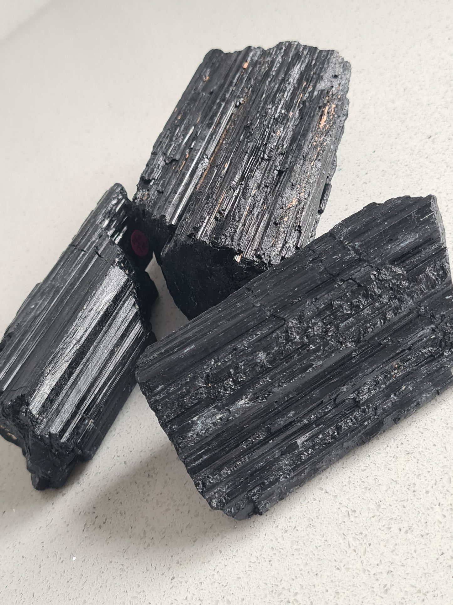 Three raw chunks of natural Black Tourmaline from Brazil
