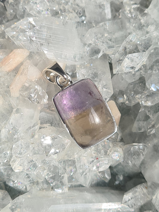 An Ametrine Pendant, rectangular shaped cabochon, in sterling silver